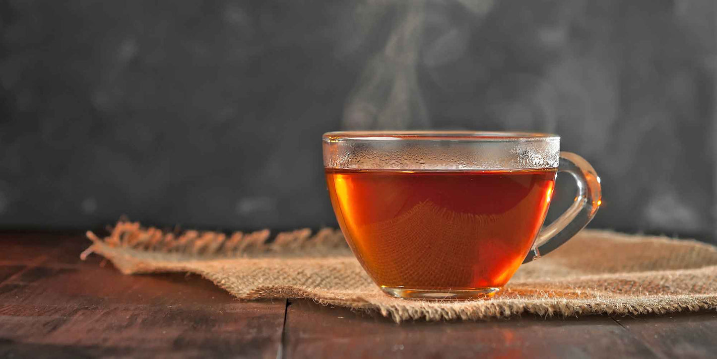 Black Tea in Cup on Table
