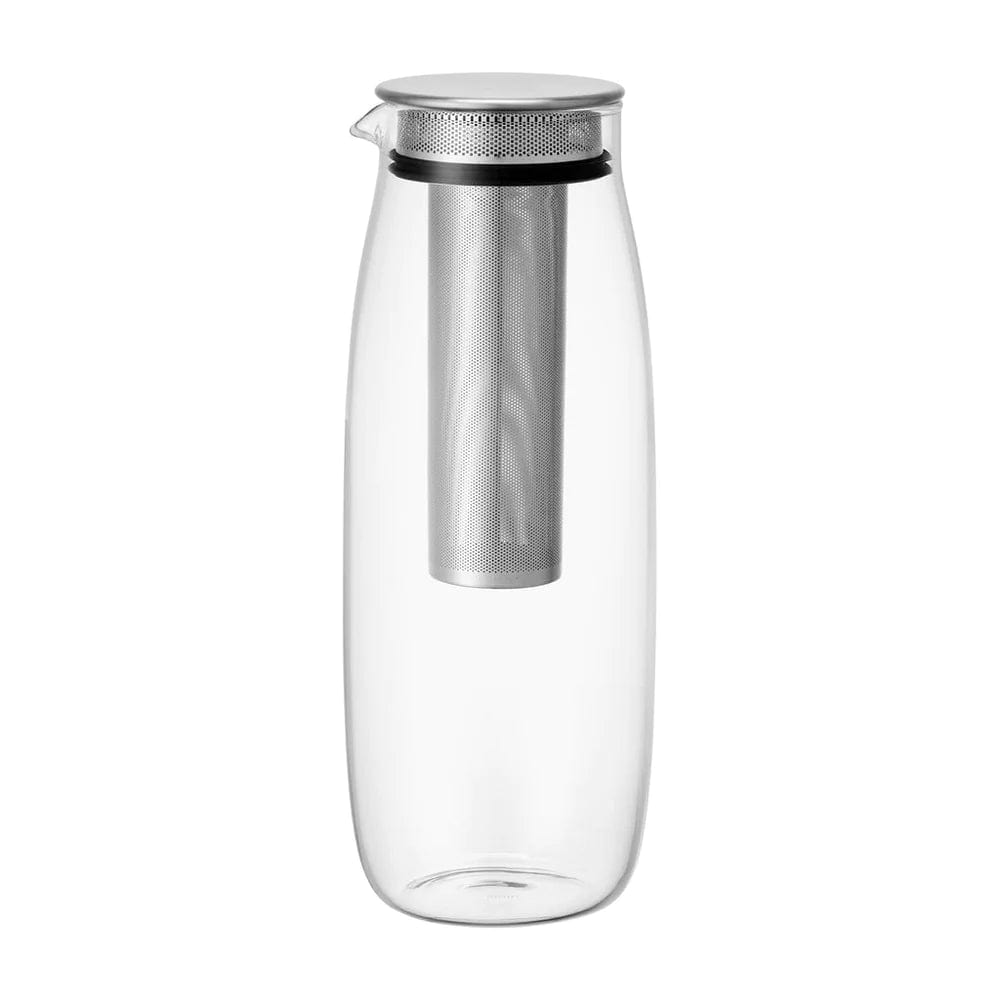Clear glass pitcher with a silver perforated infuser and lid.