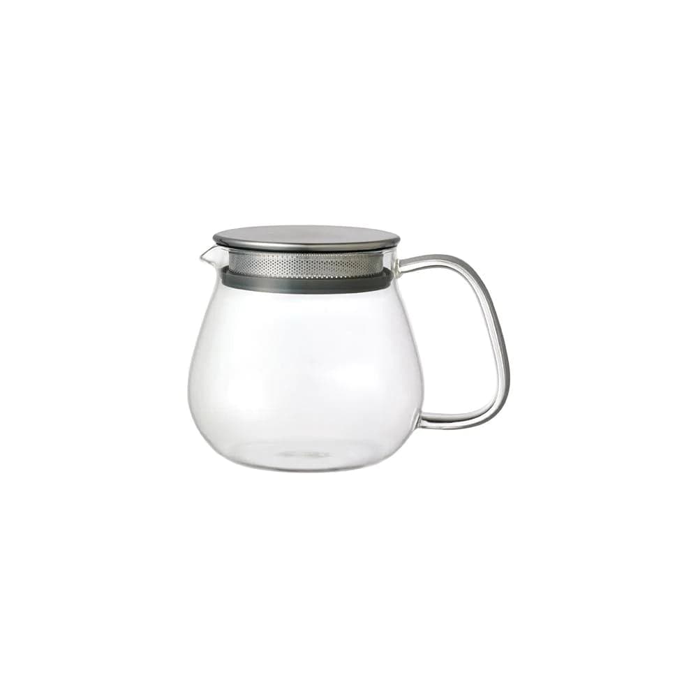 Clear glass teapot with a metal lid and a handle.