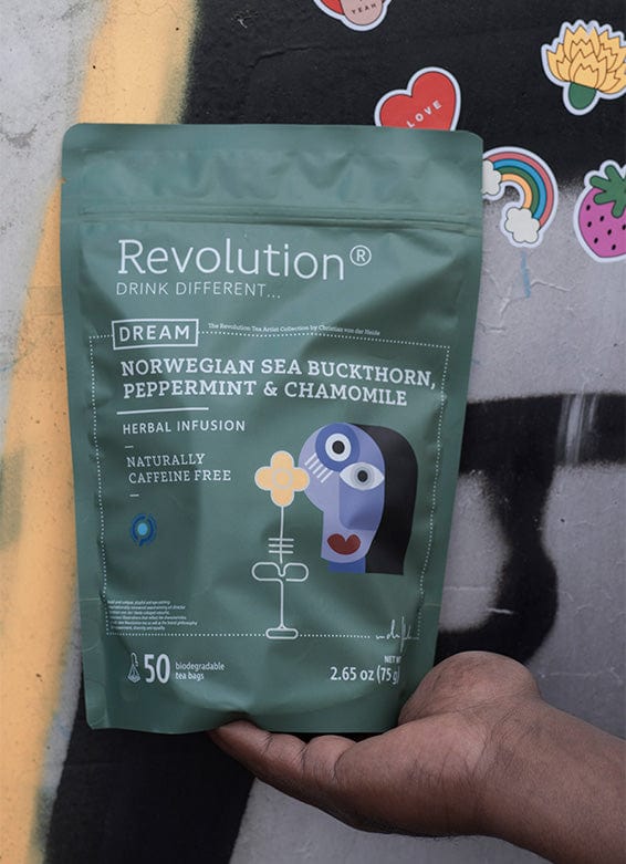 Hand presents Norwegian Sea Buckthorn, Peppermint & Chamomile pouch; wall stickers.