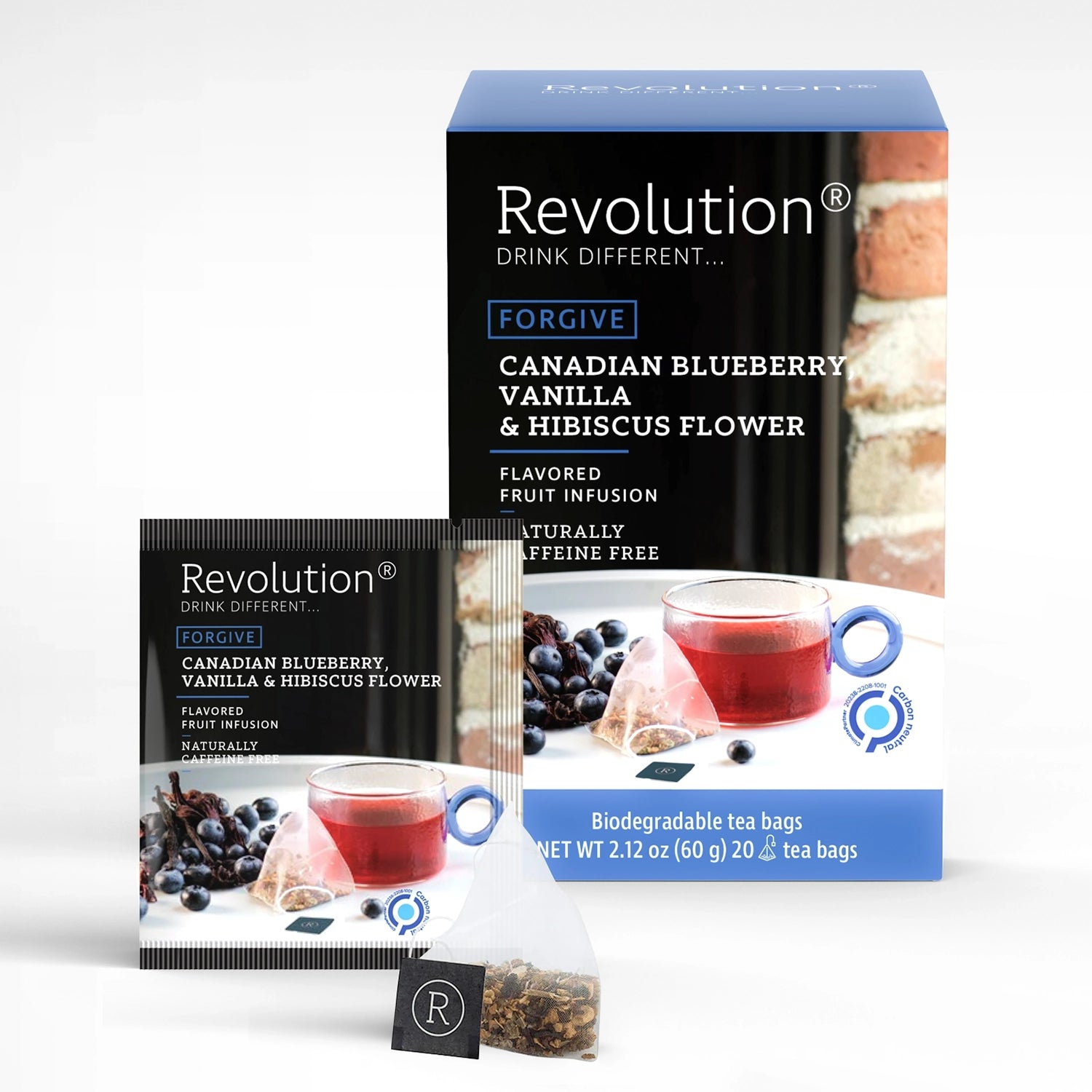 Packet and box of Forgive Canadian Blueberry, Vanilla & Hibiscus Flower tea with berries and a cup.