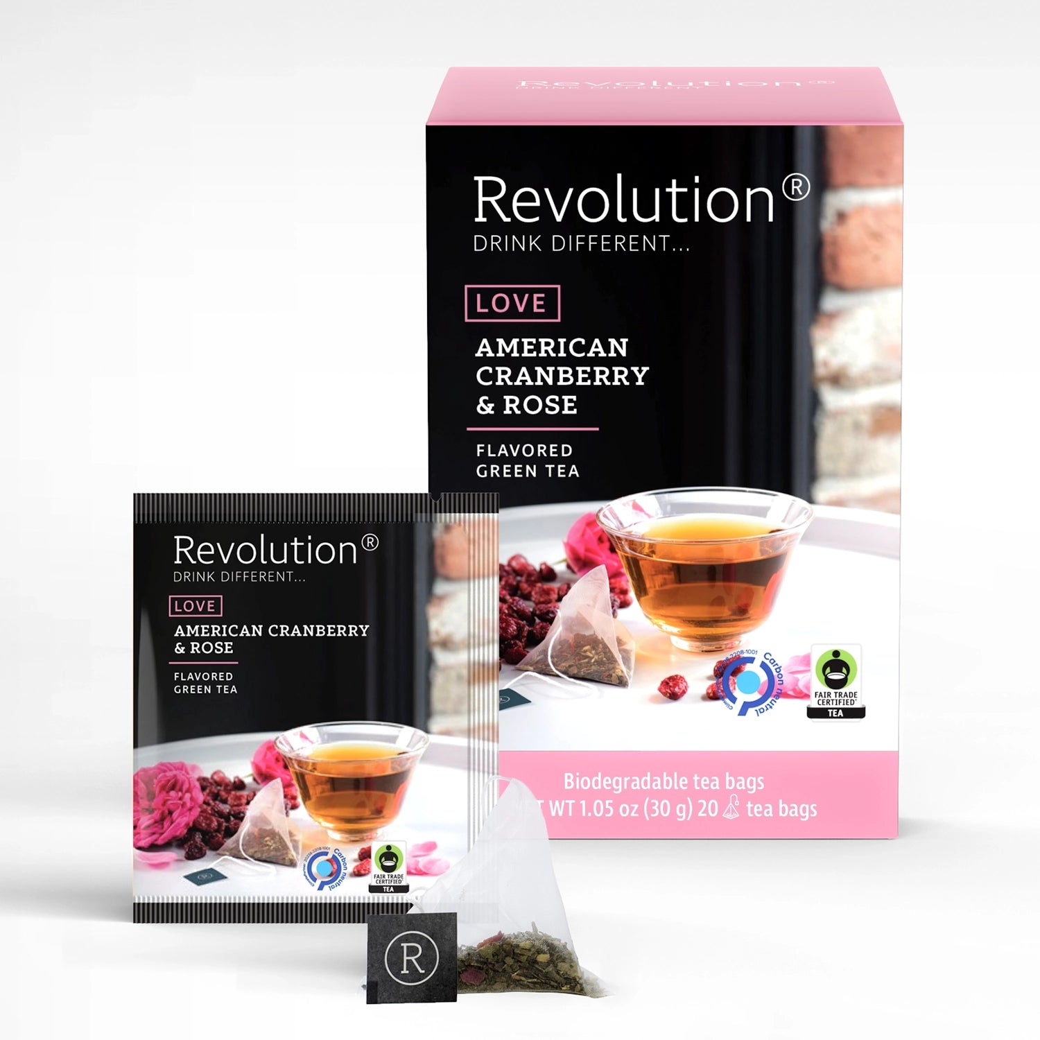 Box of American Cranberry & Rose tea with a teacup and tea bag in the foreground.