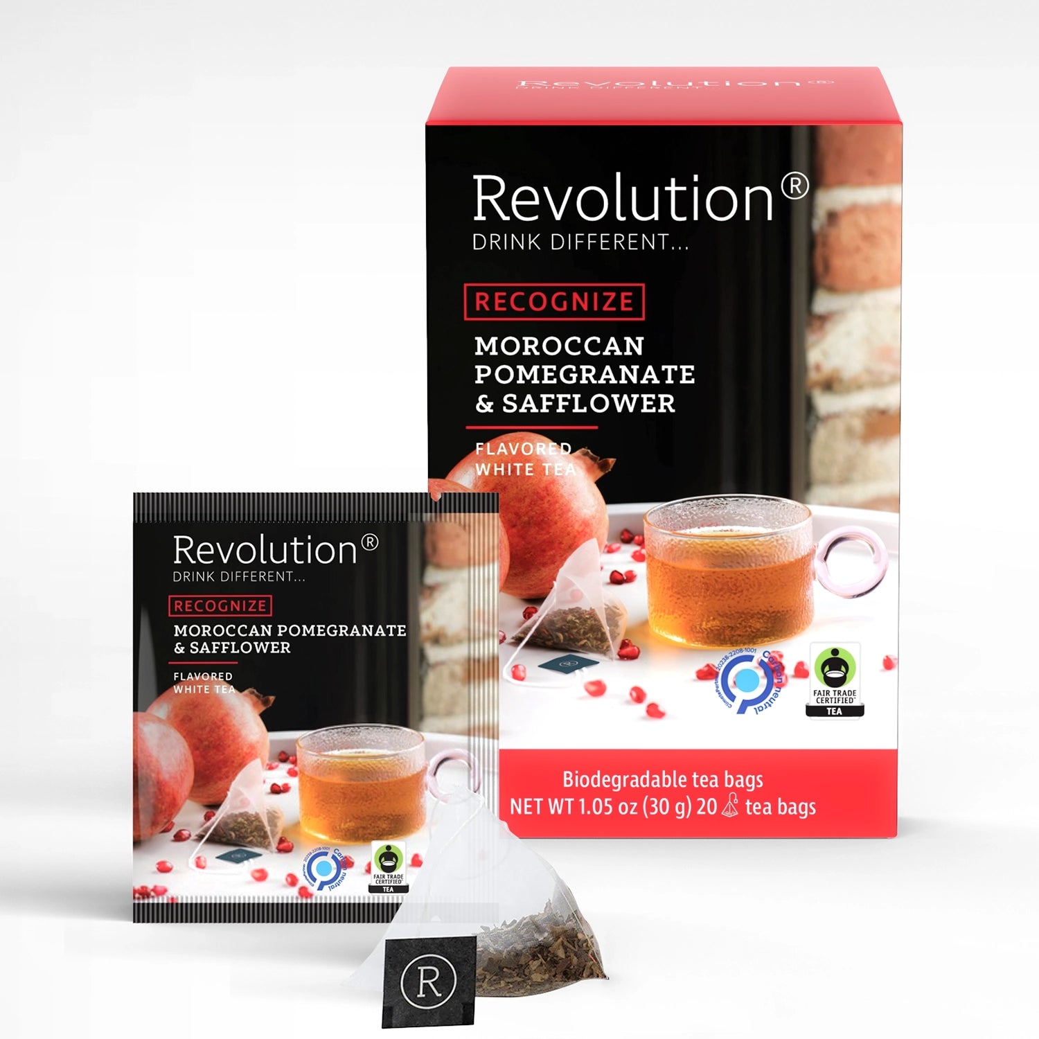 Box of Moroccan Pomegranate & Safflower tea with a teacup and tea bag.