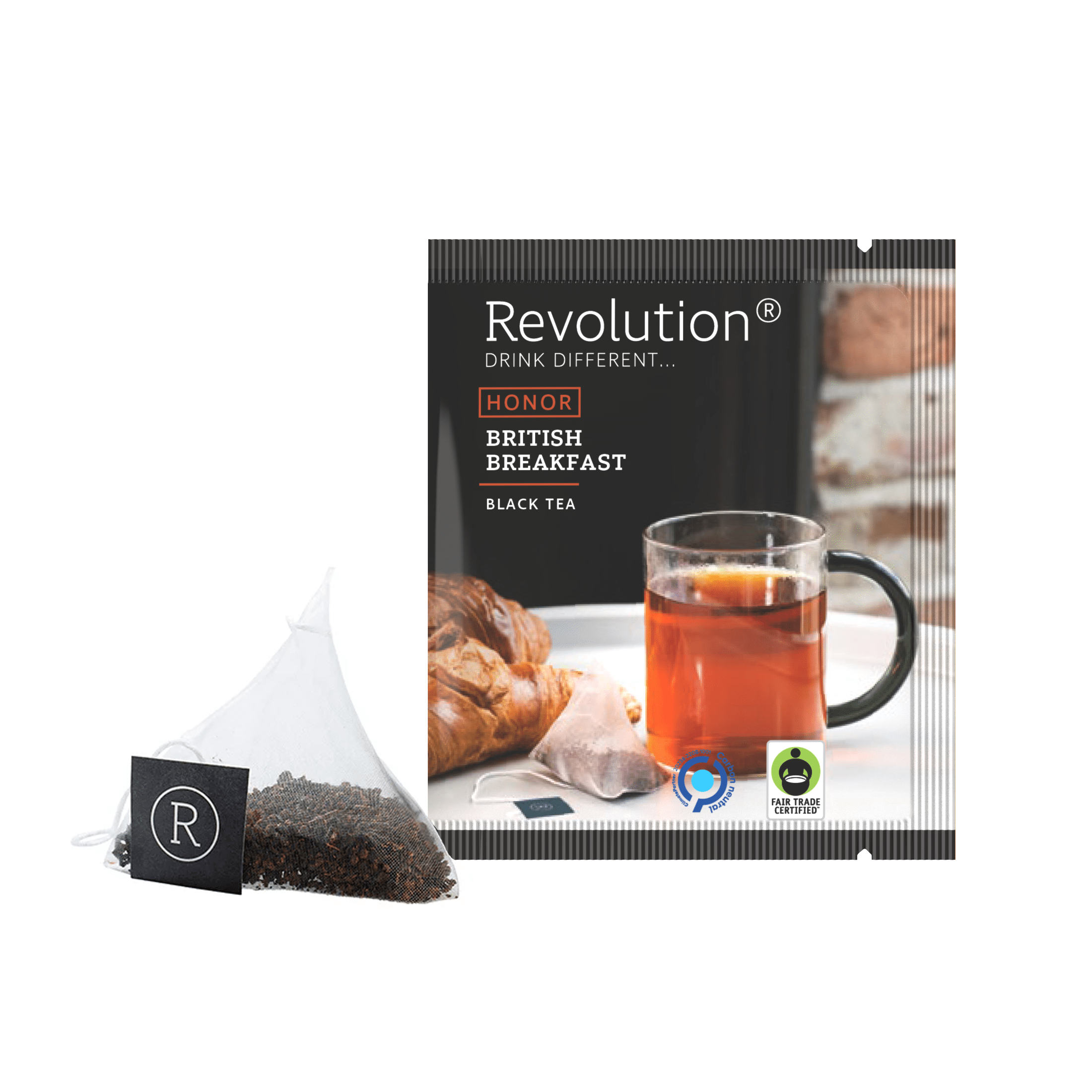 Tea bag and box featuring British Breakfast black tea beside a croissant.