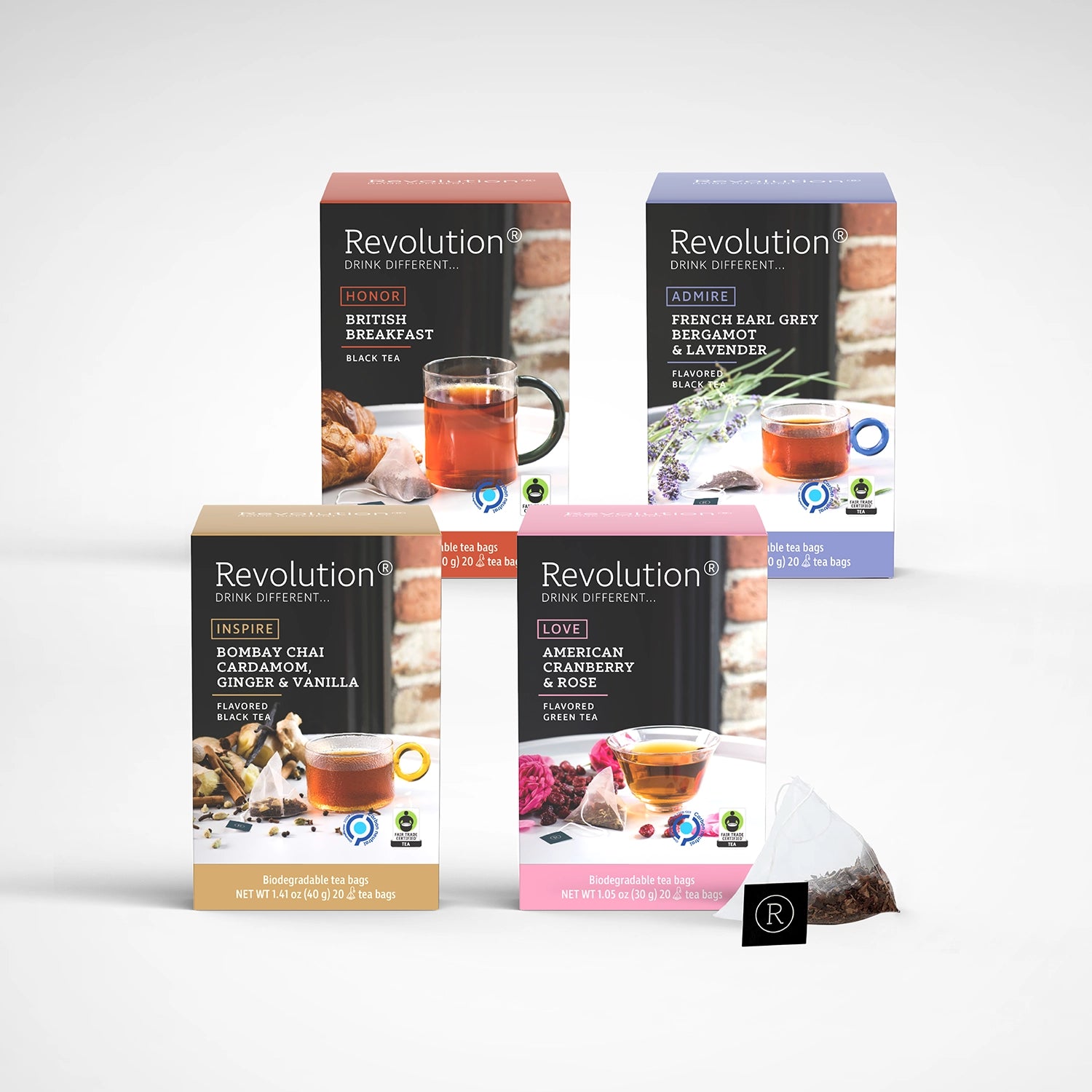Five colorful tea boxes with transparent tea bags in a row.