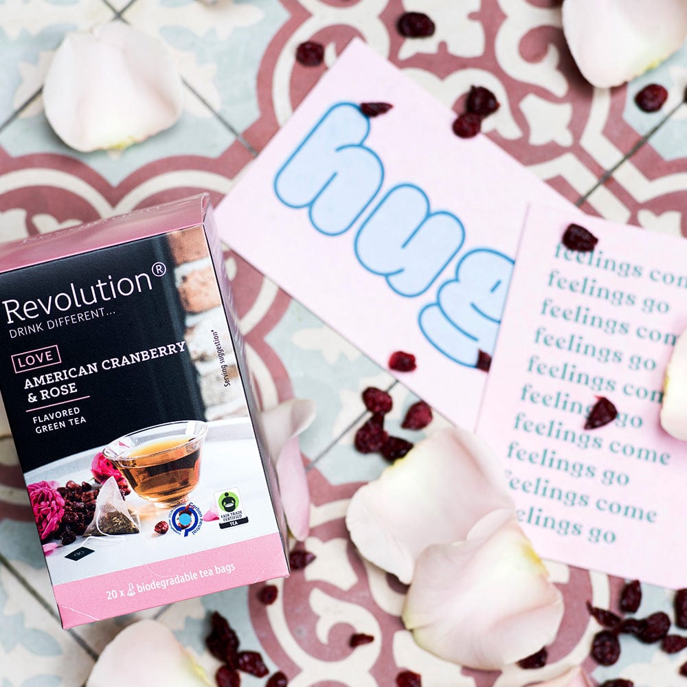 American Cranberry and Rose tea box with flower petals and a 'feelings' card.