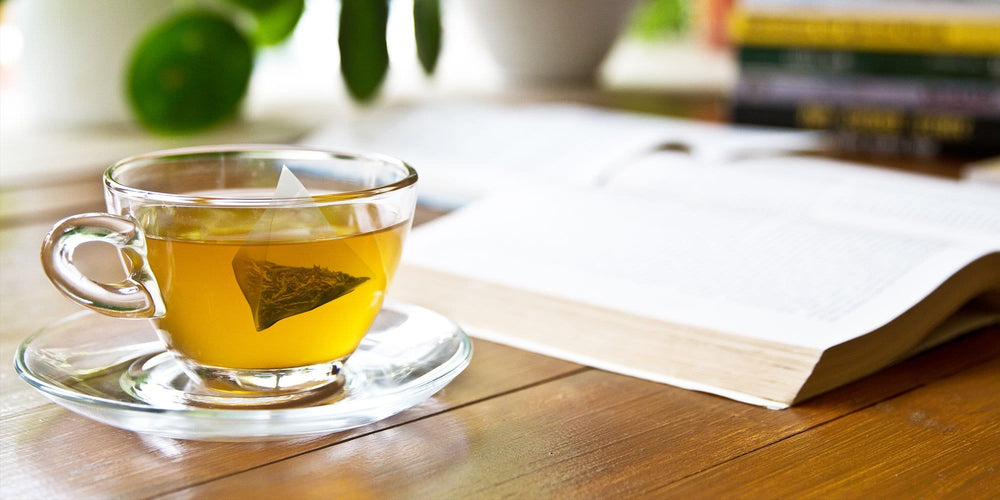 Green Tea in Cup on Table