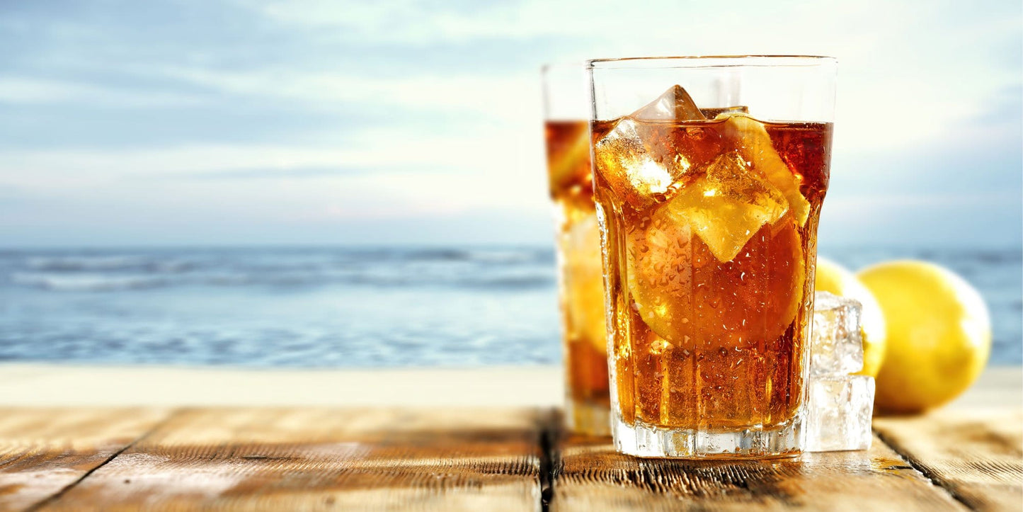 Image of Iced Tea in Glass on the Beach