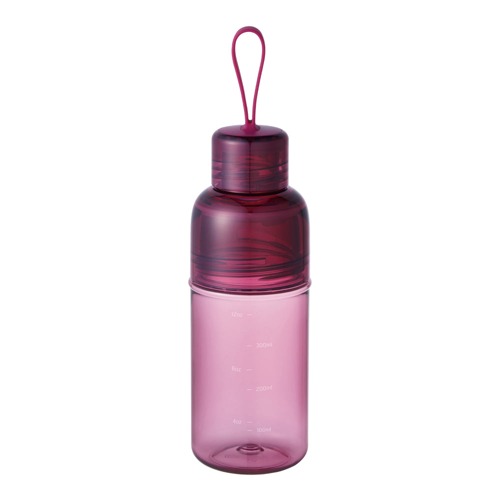 Pink water bottle with a loop handle, marked with measurements.