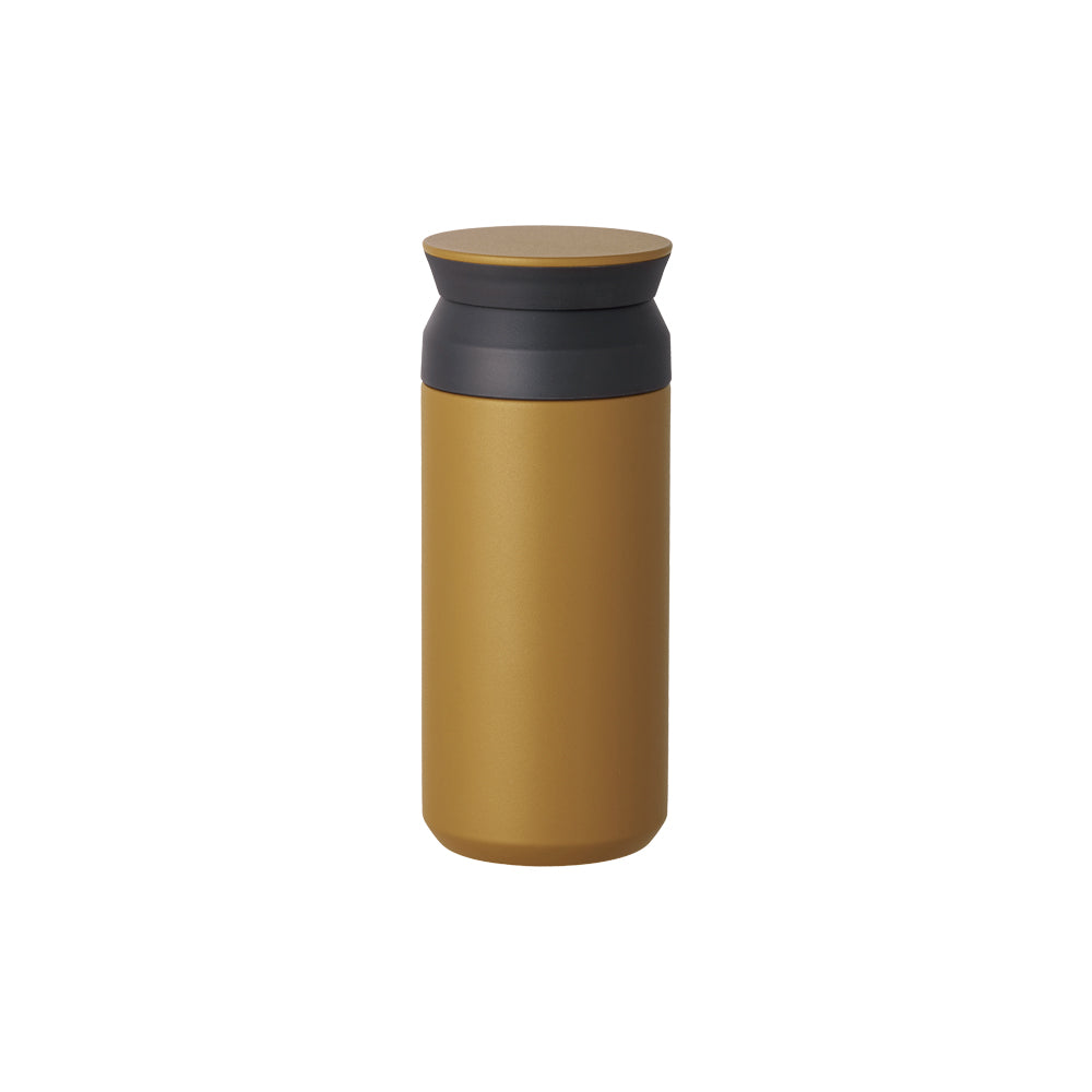 Mustard yellow travel mug with a dark gray lid, matte finish, standing upright.