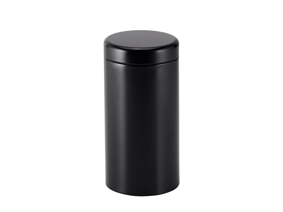 Sleek black cylindrical tin on a white background.