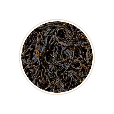 Dark tea leaves with a slightly twisted appearance.