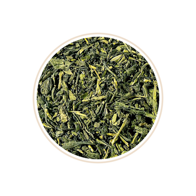 Fine green tea leaves uniformly cut in a round bowl.