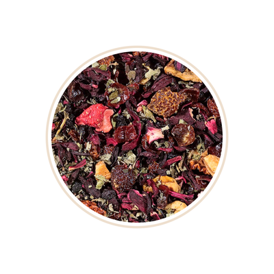 Mixed dried fruits, leaves, and flower petals in a round bowl.