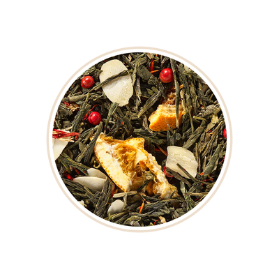 Green tea leaves with orange peel slices and small red berries.