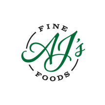 Green script 'AJ's Fine Foods' inside a circle on a transparent background.