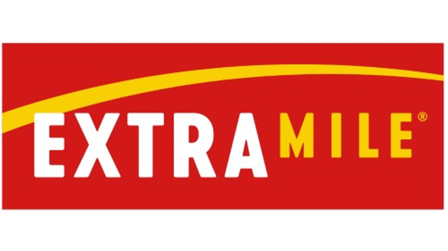 Red rectangle with bold white text: EXTRA MILE.